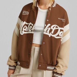 Brown varsity jacket